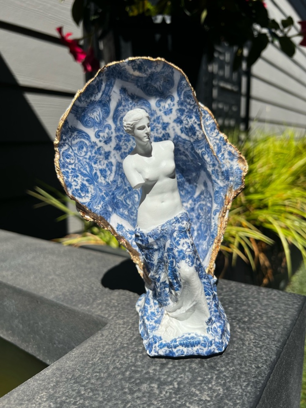 Blue and White Porcelain Venus Figurine with Gold-Trim Shell